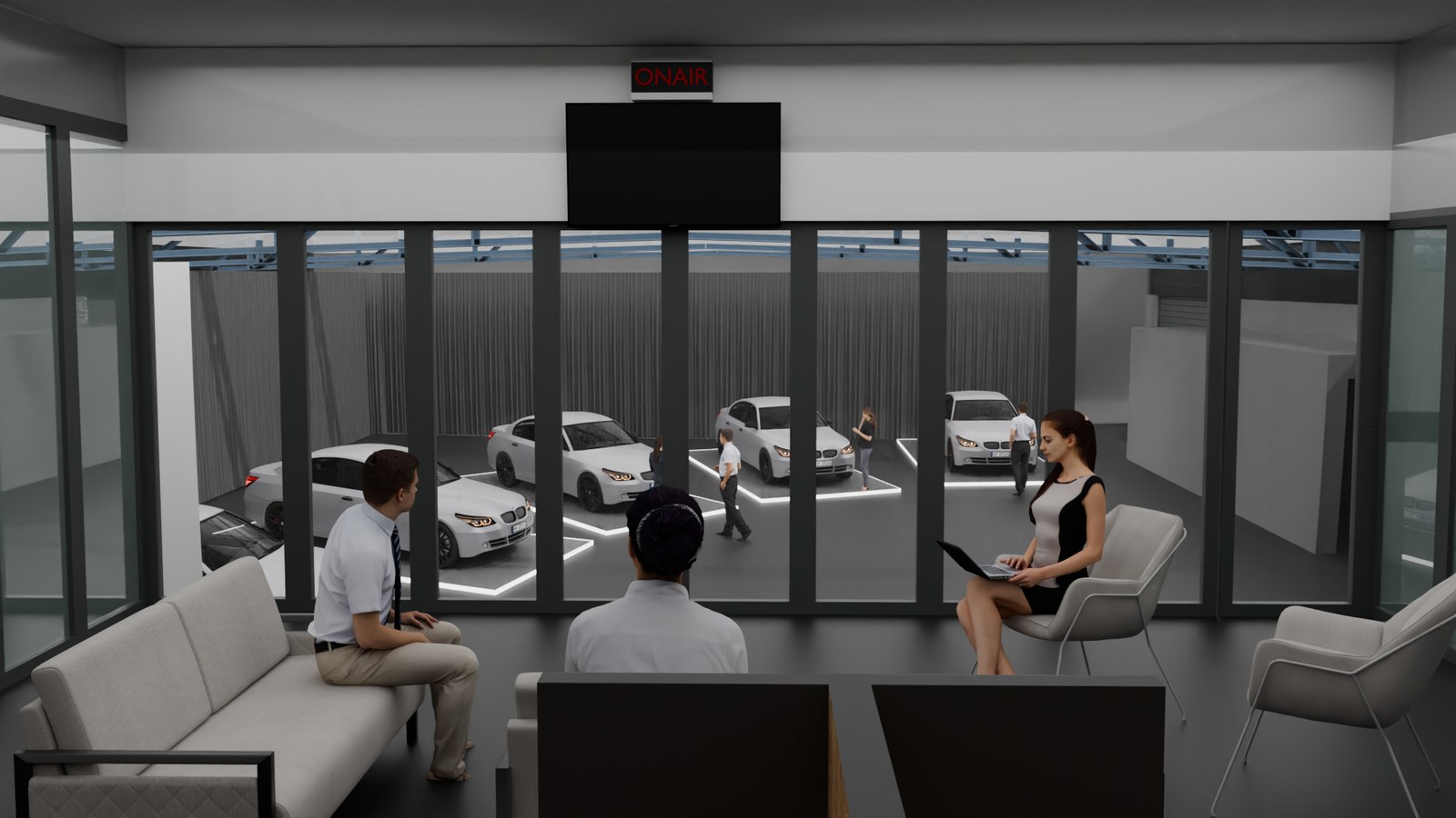 Blick aus der Skylounge durch die Glasfront auf die Fahrzeuge im Studio